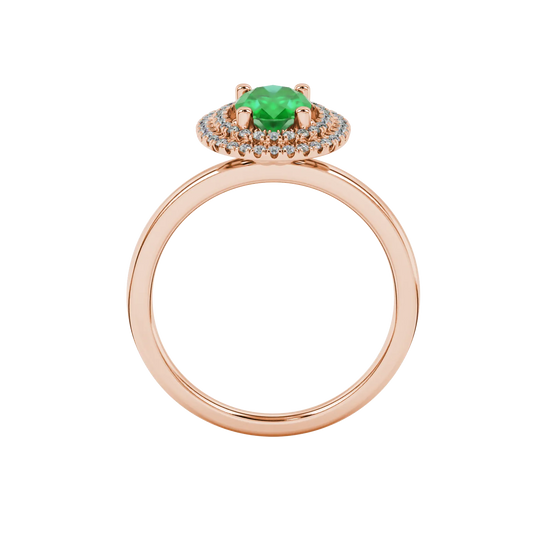 Oval cut emerald green gemstone ring, rose gold falling edge halo setting.