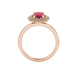 Oval cut raspberry red gemstone ring, rose gold falling edge halo setting.
