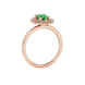 Side profile, rose gold emerald green ring, falling edge halo gallery.