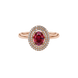 Close-up, oval cut raspberry red gemstone ring, rose gold double halo.