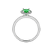 Oval cut emerald green gemstone ring, white gold french pavé halo setting.