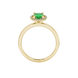 Oval cut emerald green gemstone ring, yellow gold french pavé halo setting.