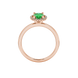 Oval cut emerald green gemstone ring, rose gold french pavé halo setting.