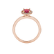 Oval cut raspberry red gemstone ring, rose gold french pavé halo setting.