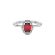 Close-up raspberry red gemstone ring, white gold french pavé halo.