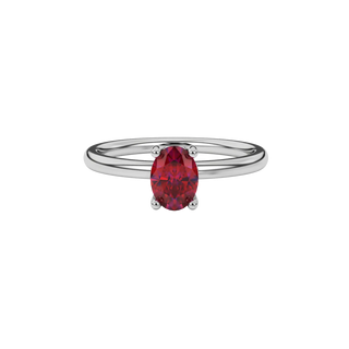 Close-up oval cut raspberry red gemstone ring, white gold lotus basket.
