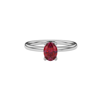 Close-up oval cut raspberry red gemstone ring, white gold lotus basket.