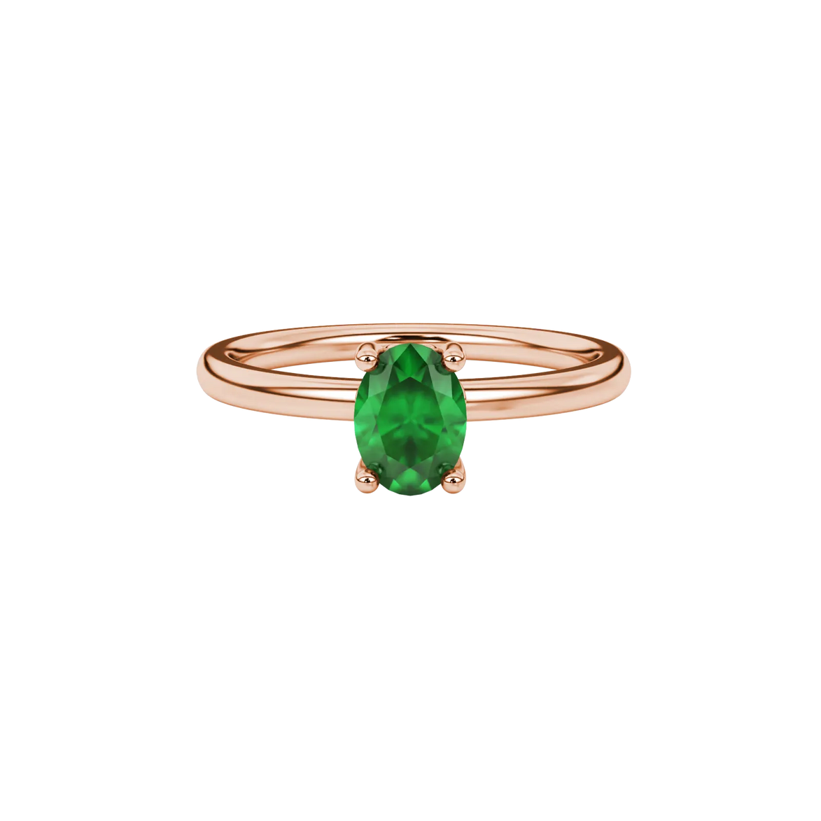 Close-up, oval cut emerald green gemstone ring, rose gold lotus basket.