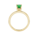 Oval cut emerald green gemstone ring, yellow gold lotus basket setting.