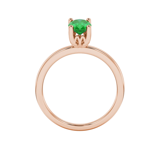 Oval cut emerald green gemstone ring, rose gold lotus basket setting.