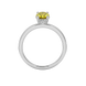 Oval cut canary yellow gemstone ring, white gold pavé basket setting.