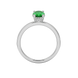 Oval cut emerald green gemstone ring, white gold pavé basket setting.
