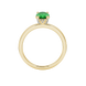 Oval cut emerald green gemstone ring, yellow gold pavé basket setting.