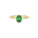 Close-up, oval cut emerald green gemstone, yellow gold pavé basket ring.