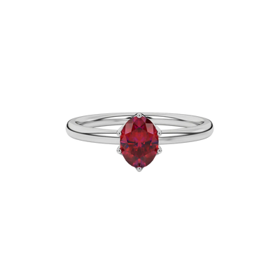 Close-up oval cut raspberry red gemstone ring, white gold scalloped six prong setting.