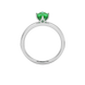 Oval cut emerald green gemstone ring, white gold scalloped six prong setting.