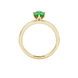 Oval cut emerald green gemstone ring, yellow gold scalloped six prong setting.
