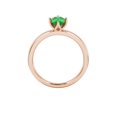 Oval cut emerald green gemstone ring, rose gold scalloped six prong setting.
