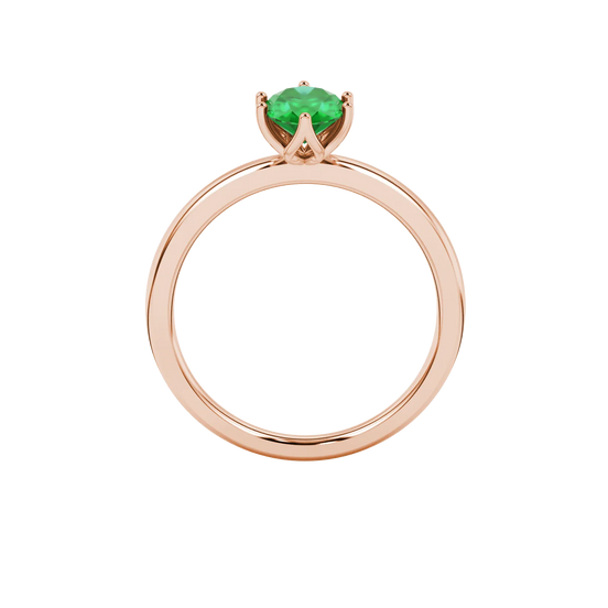 Oval cut emerald green gemstone ring, rose gold scalloped six prong setting.