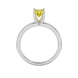 Oval cut canary yellow gemstone ring, white gold surprise diamond setting.