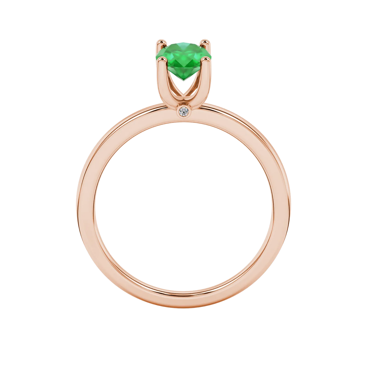 Oval cut emerald green gemstone ring, rose gold surprise diamond setting.
