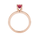 Oval cut raspberry red gemstone ring, rose gold surprise diamond setting.