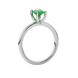 Side profile, white gold emerald green ring, surprise diamond gallery.