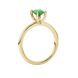 Side profile, yellow gold emerald green ring, surprise diamond gallery.