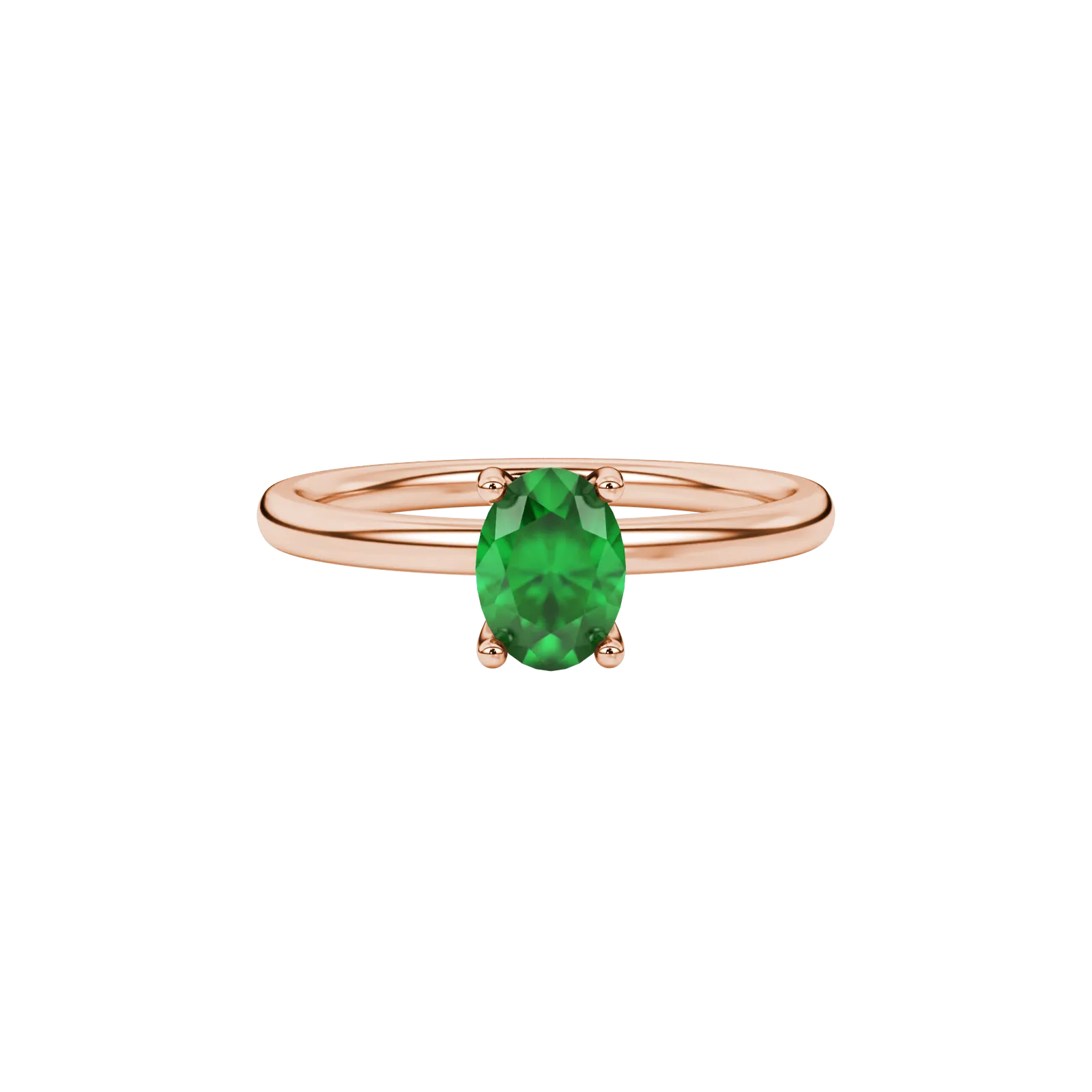 Close-up, oval cut emerald green gemstone ring, rose gold surprise diamond setting.