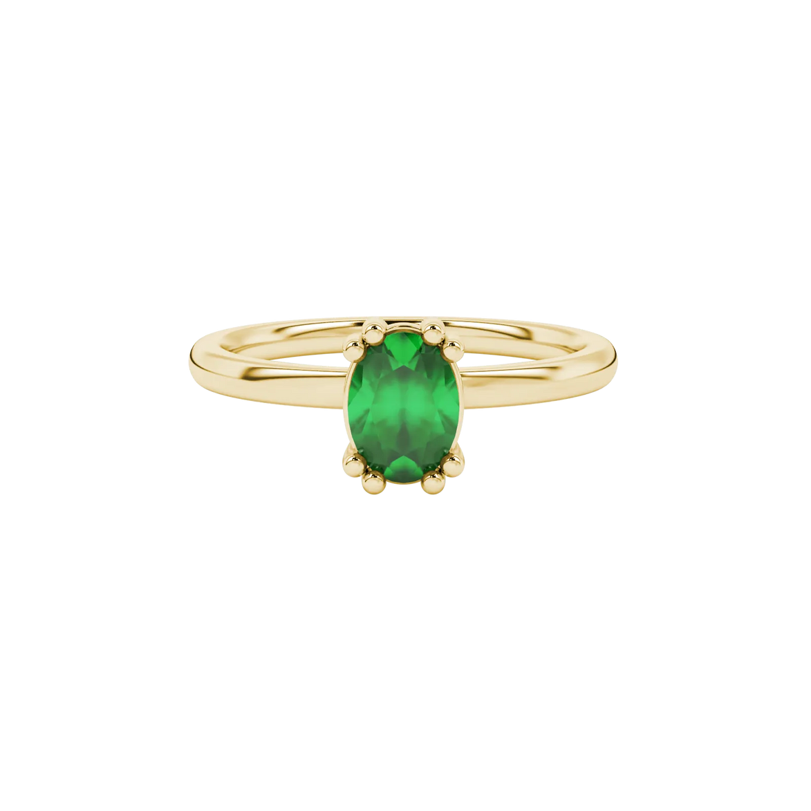 Close-up, oval cut emerald green gemstone, yellow gold vintage basket ring.