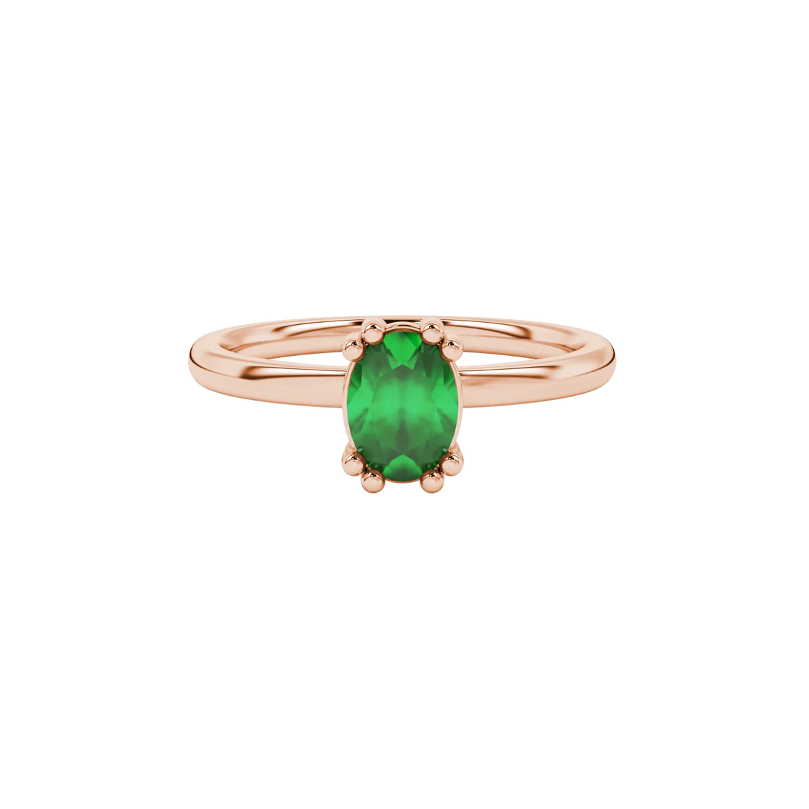 Close-up, oval cut emerald green gemstone ring, rose gold vintage basket.