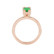 Oval cut emerald green gemstone ring, rose gold vintage basket setting.