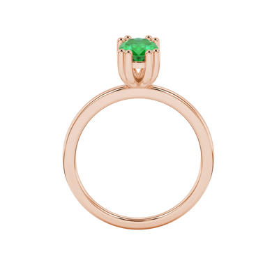 Oval cut emerald green gemstone ring, rose gold vintage basket setting.