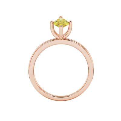 Marquise cut canary yellow gemstone ring, rose gold four prong setting.