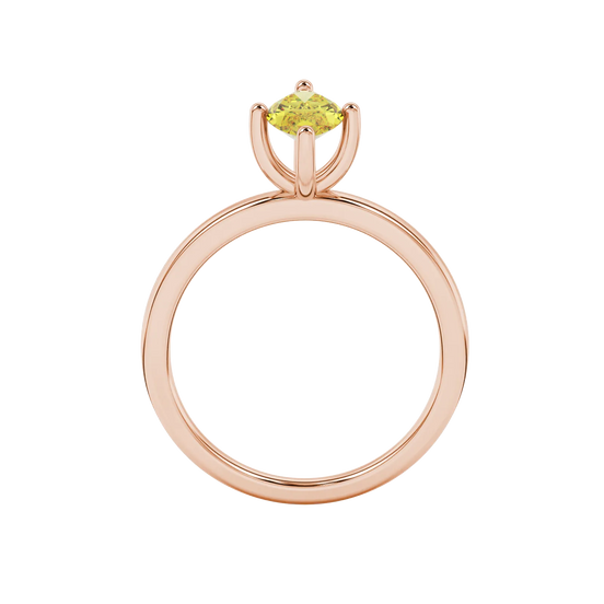 Marquise cut canary yellow gemstone ring, rose gold four prong setting.