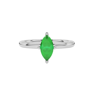 Close-up marquise cut emerald green gemstone ring, white gold four prong.