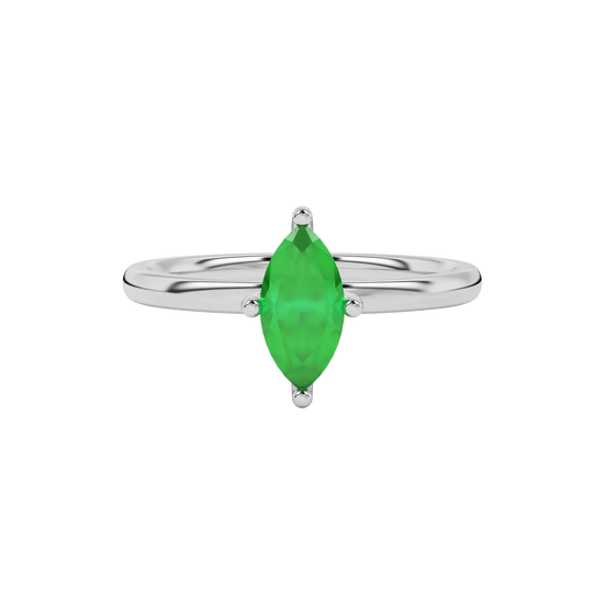 Close-up marquise cut emerald green gemstone ring, white gold four prong.