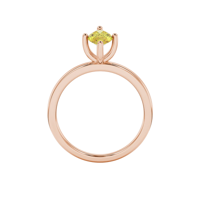 Marquise cut canary yellow gemstone ring, rose gold six prong setting.
