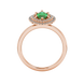 Marquise cut emerald green gemstone ring, rose gold falling edge halo setting.