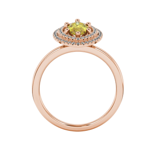 Marquise cut canary yellow gemstone ring, rose gold falling edge halo setting.