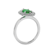 Side profile, white gold emerald green ring, falling edge halo gallery.