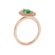 Side profile, rose gold emerald green ring, falling edge halo gallery.