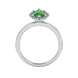 Marquise cut emerald green gemstone ring, white gold French pavé halo setting.