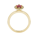 Marquise cut raspberry red gemstone ring, yellow gold French pavé halo setting.