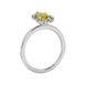 Side profile, white gold canary yellow ring, French pavé halo gallery.