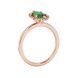 Side profile, rose gold emerald green ring, French pavé halo gallery.