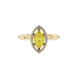 Close-up, marquise cut canary yellow gemstone, yellow gold French pavé halo ring.
