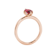 Side profile, rose gold raspberry red ring, scalloped six prong gallery.