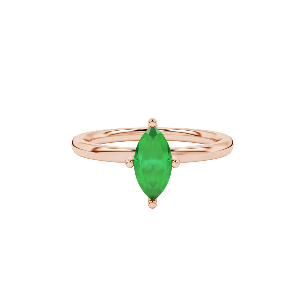 Close-up, marquise cut emerald green gemstone ring, rose gold surprise diamond setting.
