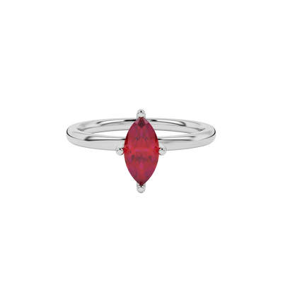Close-up marquise cut raspberry red gemstone ring, white gold surprise diamond setting.